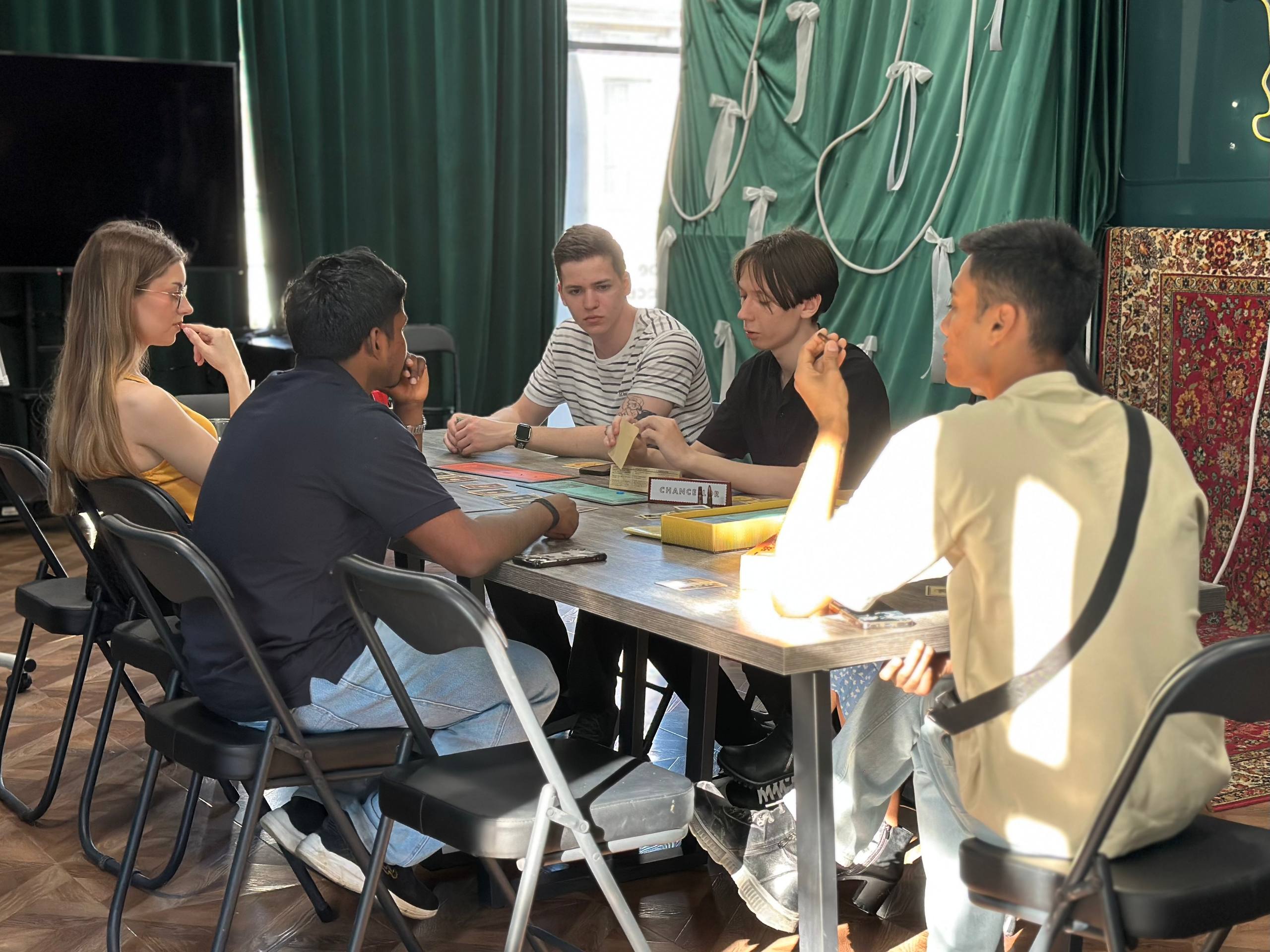 Friends discussing clues during game night